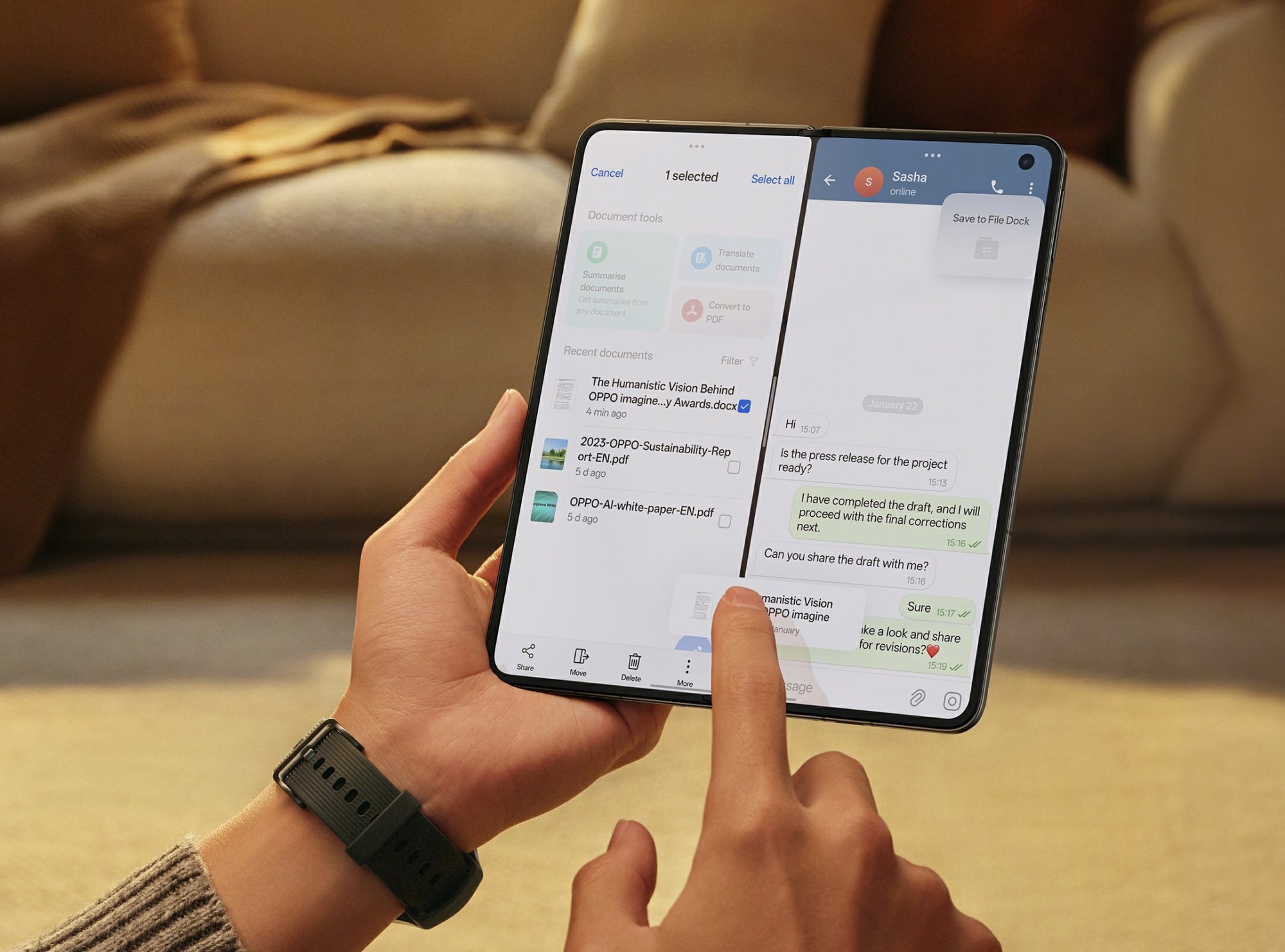 The Oppo Find N5 foldable phone shown open in a user's hands.