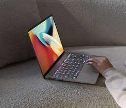 Person using Asus ZenBook A14