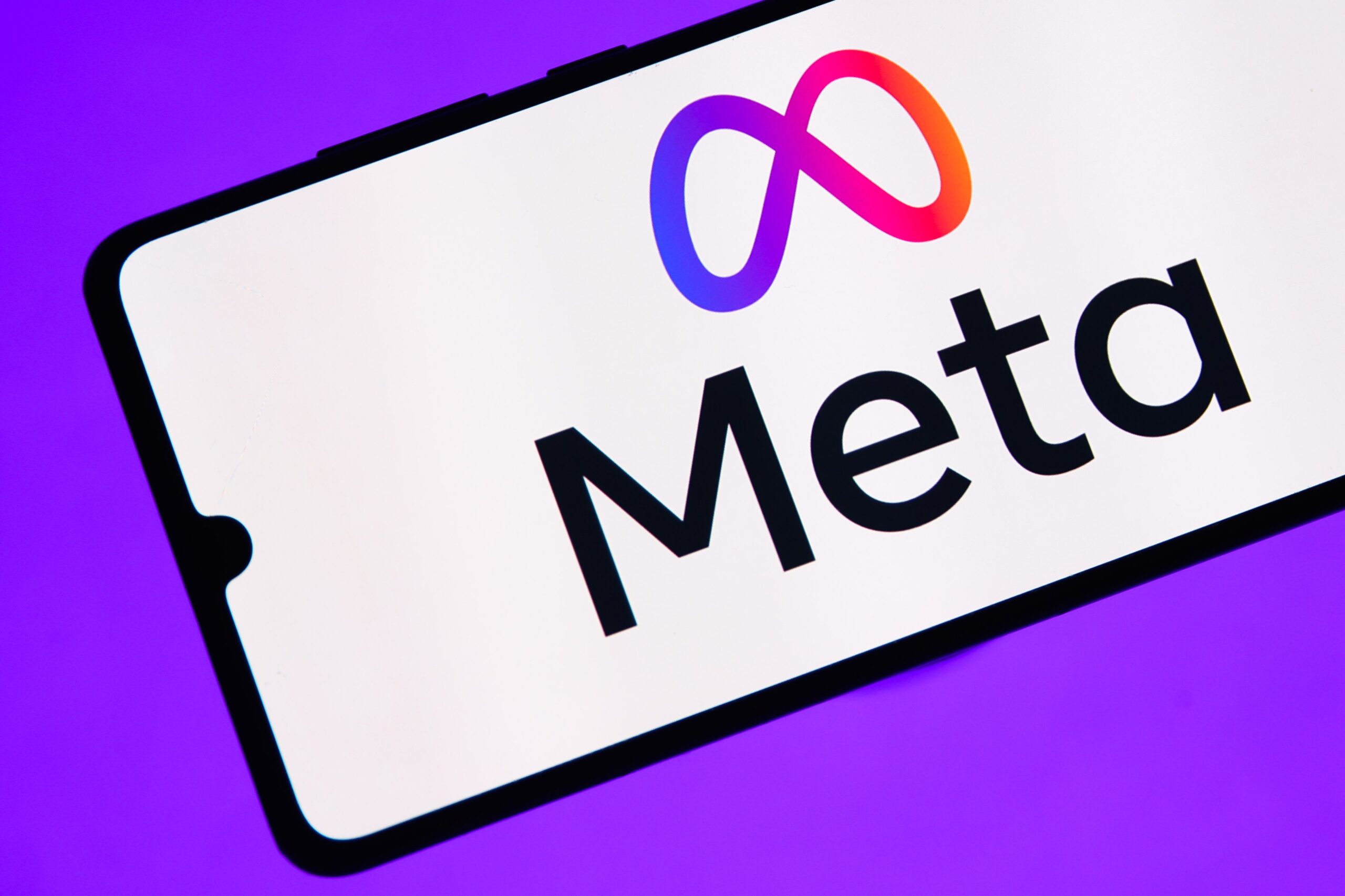 meta logo on a phone