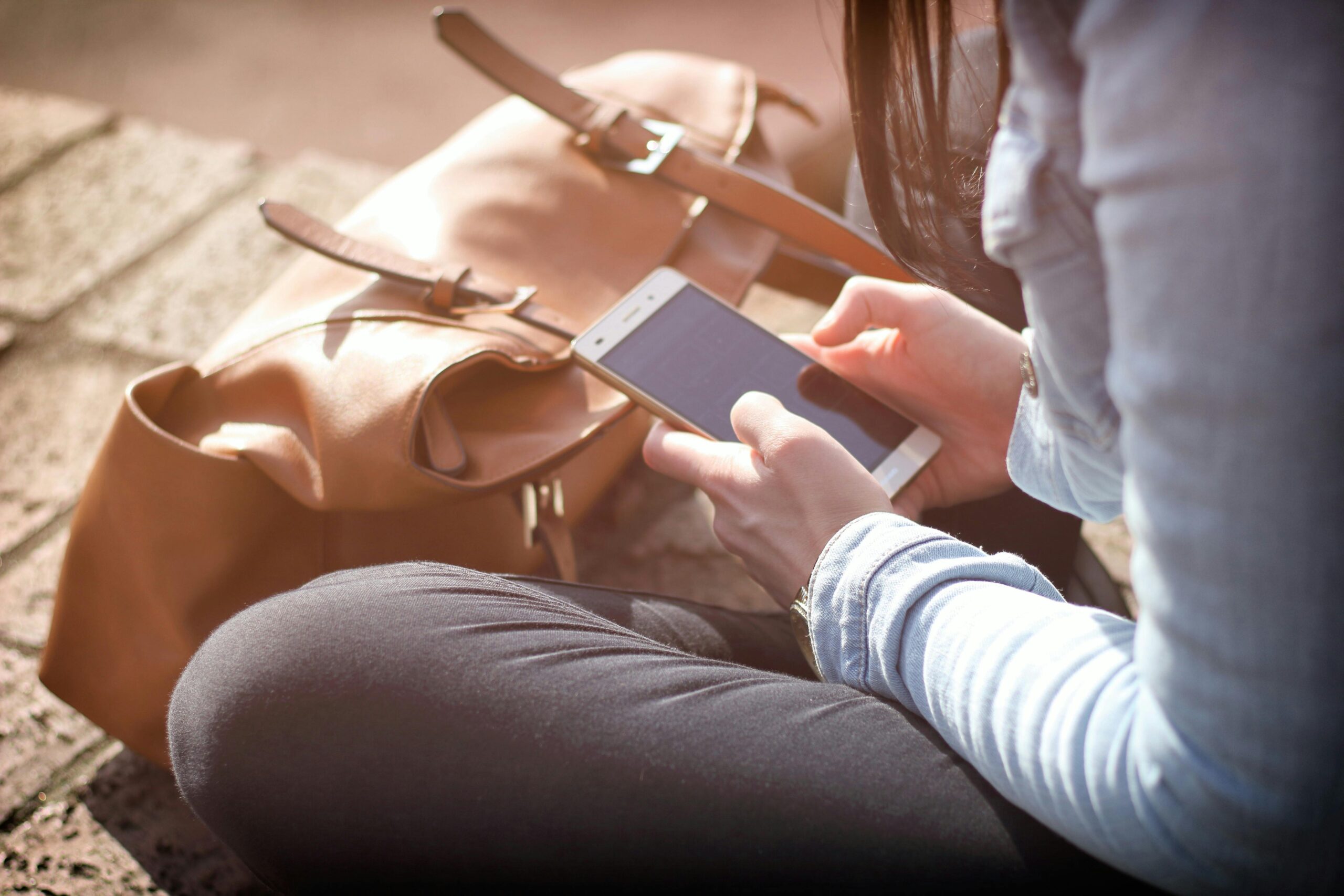 Hands holding phone