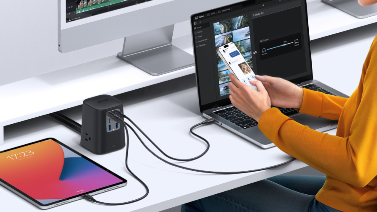 anker charging station on a desk with devices plugged into it