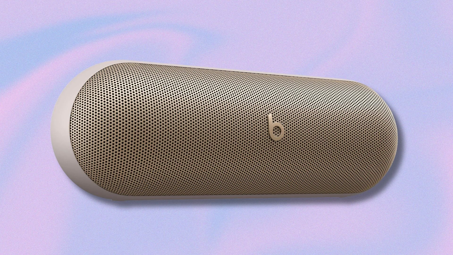 a champagne gold beats pill speaker against a light purple and light blue swirling background