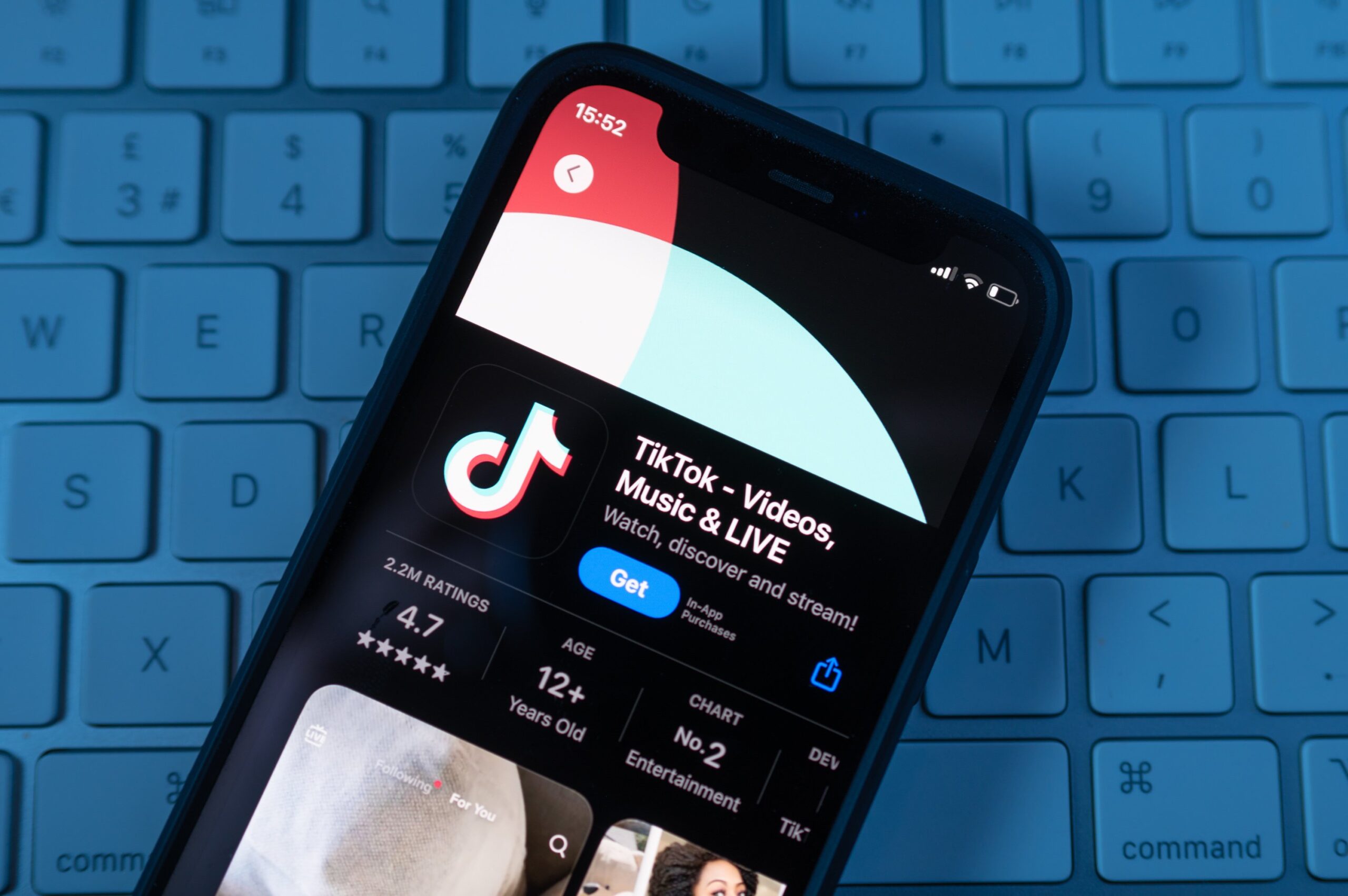 A phone showing the TikTok app in the Apple App Store. 