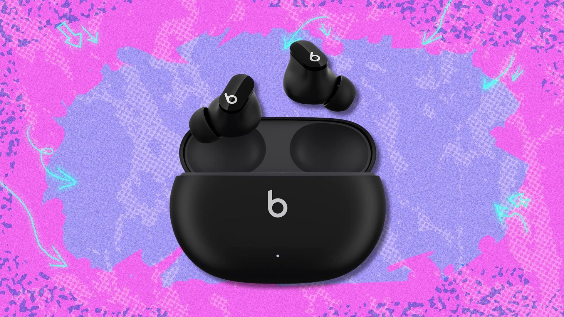 black beats studio buds earbuds against a pink and purple patterned background