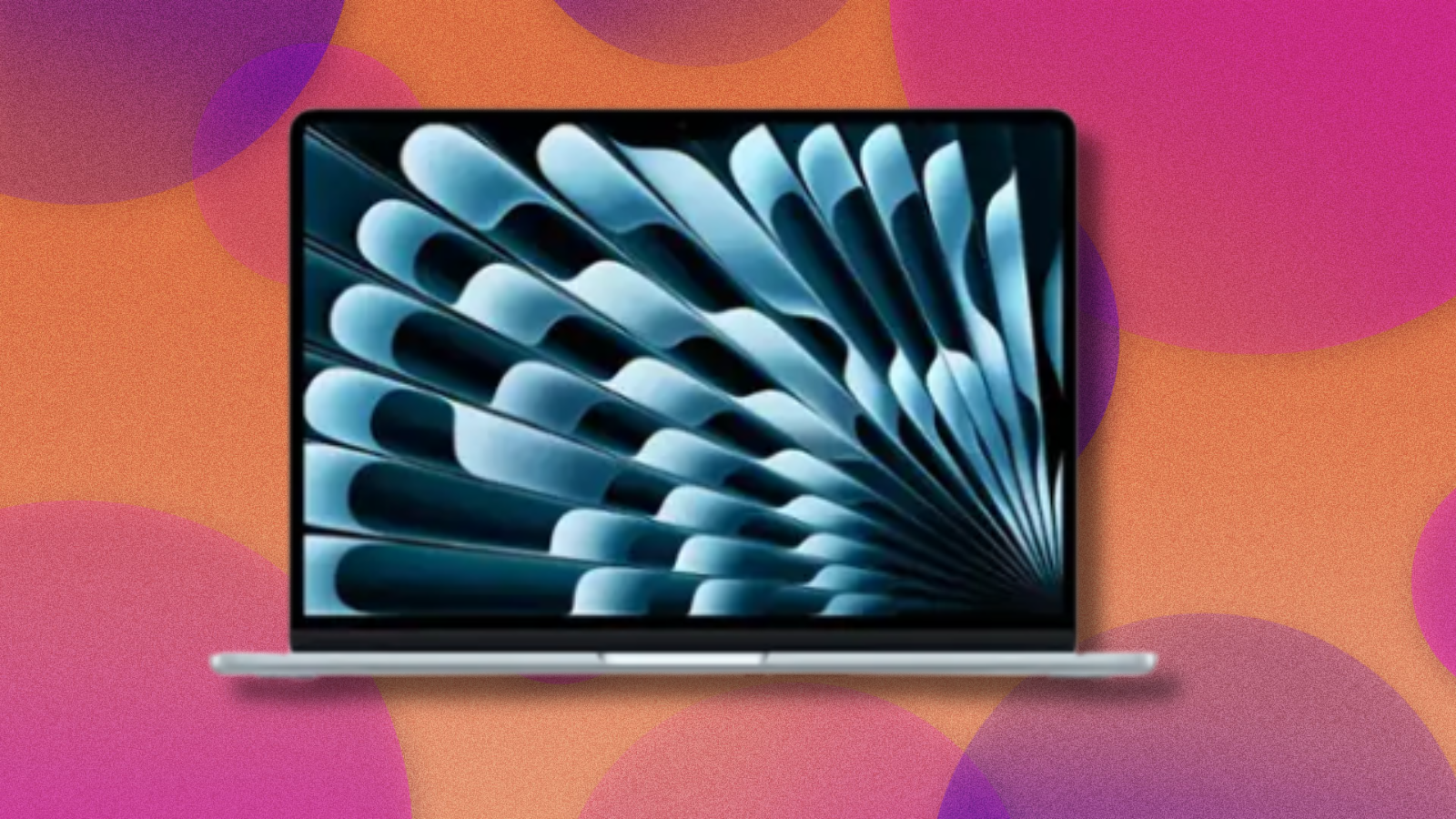 MacBook Air on orange and purple abstract background