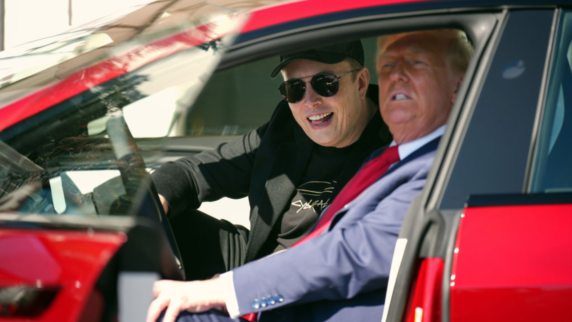 U.S. President Donald Trump and White House Senior Advisor, Tesla and SpaceX CEO Elon Musk sit in a Model S on the South Lawn of the White House on March 11, 2025 in Washington, DC.