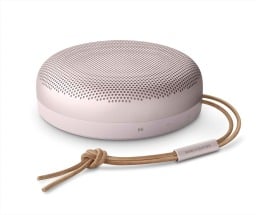 a pink bang & olufsen beosound a1 bluetooth speaker