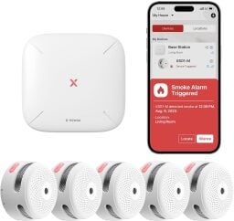 Five white orblike smoke detectors appear with a hub and a smart phone screen showing an app