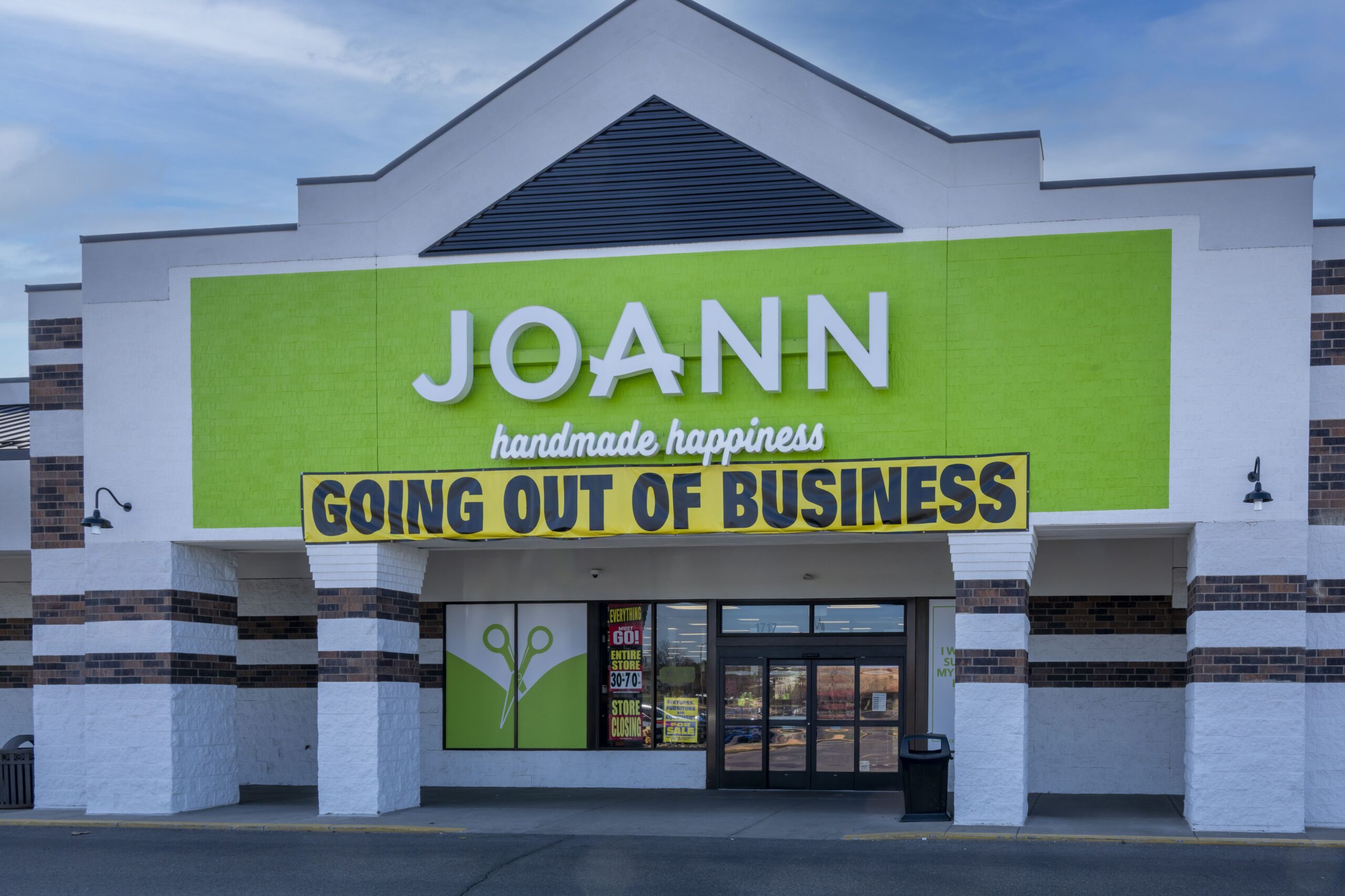 joann fabric store with a going out of business sign