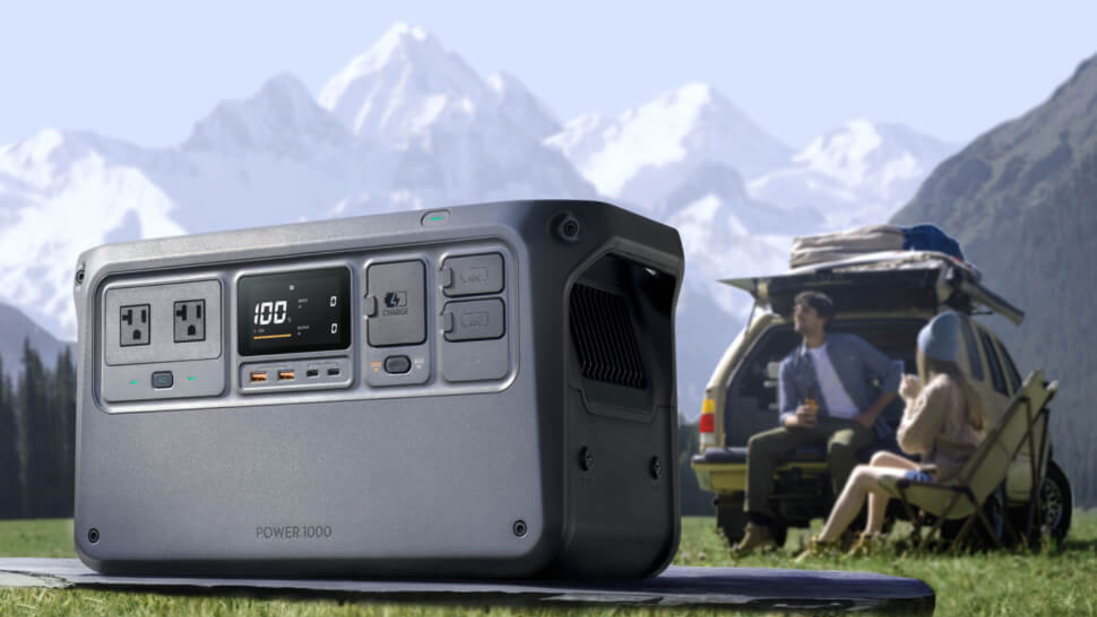 couple camping in the mountains using DJI Power 1000 power station
