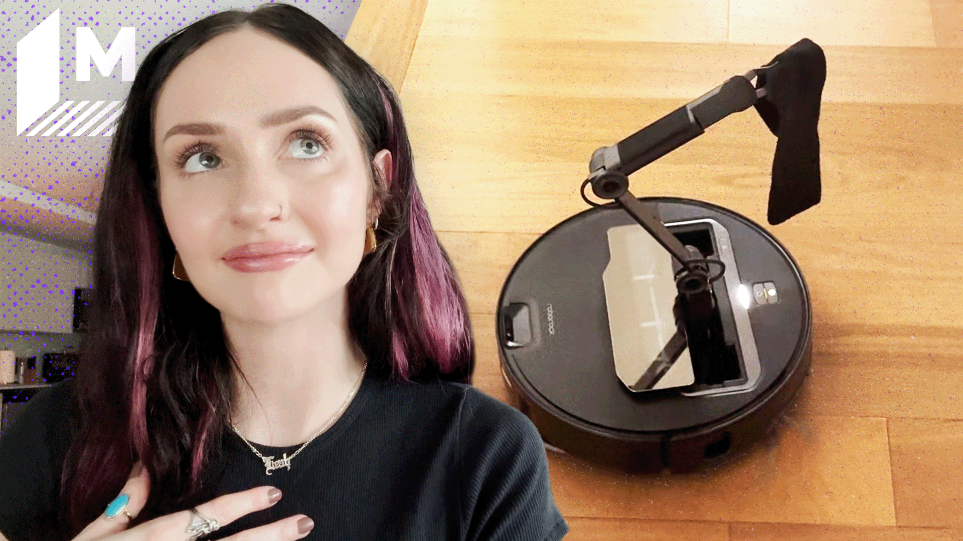 Mashable Shopping Reporter Leah Stodart looking at the Roborock SarosZ70 vacuum