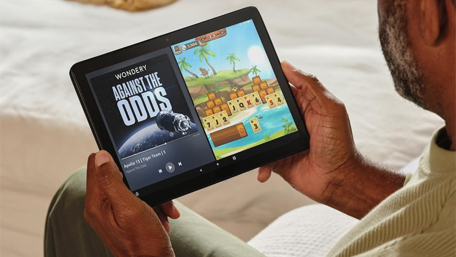 man multitasking on Fire HD 10 tablet