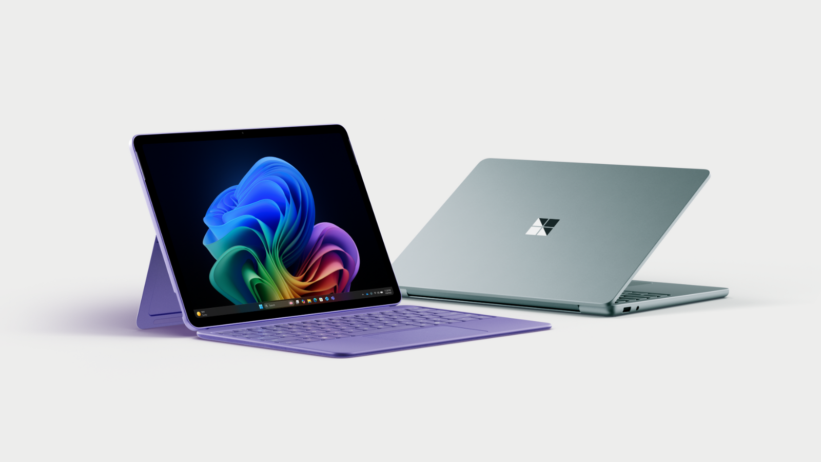 the 12-inch microsoft surface pro and 13-inch microsoft surface laptop against a light gray background