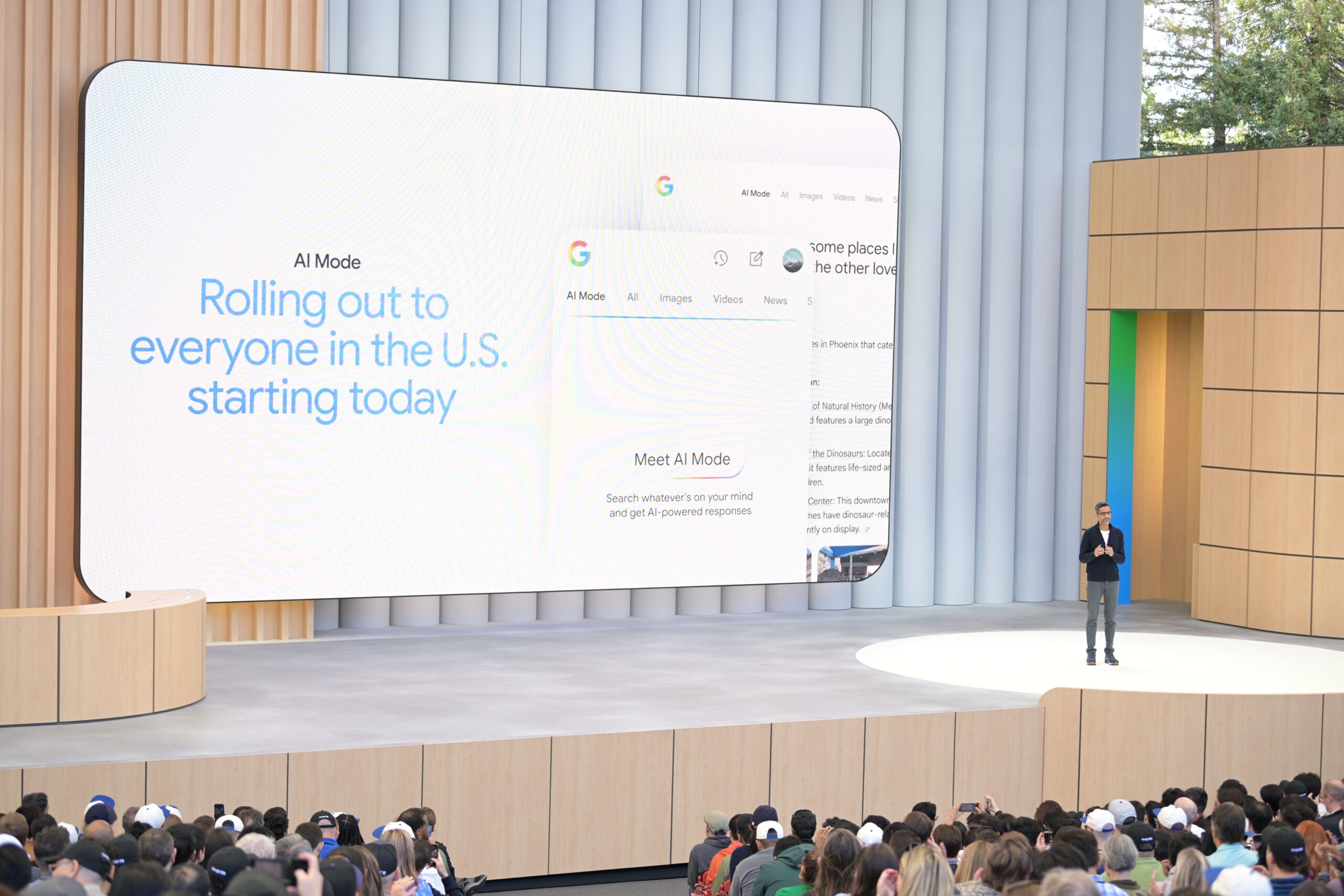 Google CEO Sundar Pichai on stage announcing AI Mode at Google I/O 2025