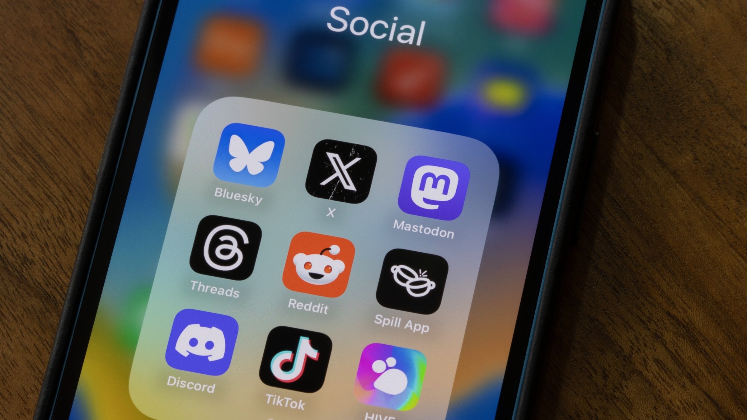 collection of social media apps on an iphone 16 screen