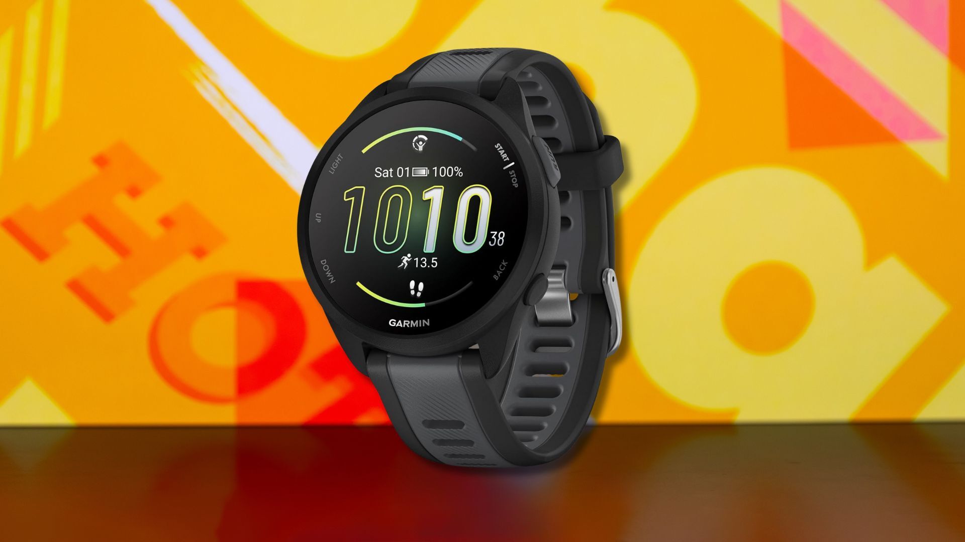 garmin forerunner 165 smartwatch against a yellow patterned background