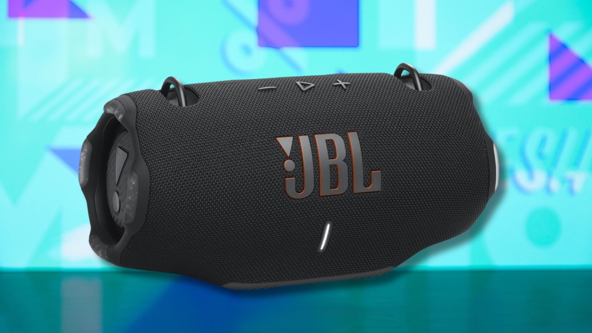 jbl xtreme 4 portable speaker against a light blue patterned background