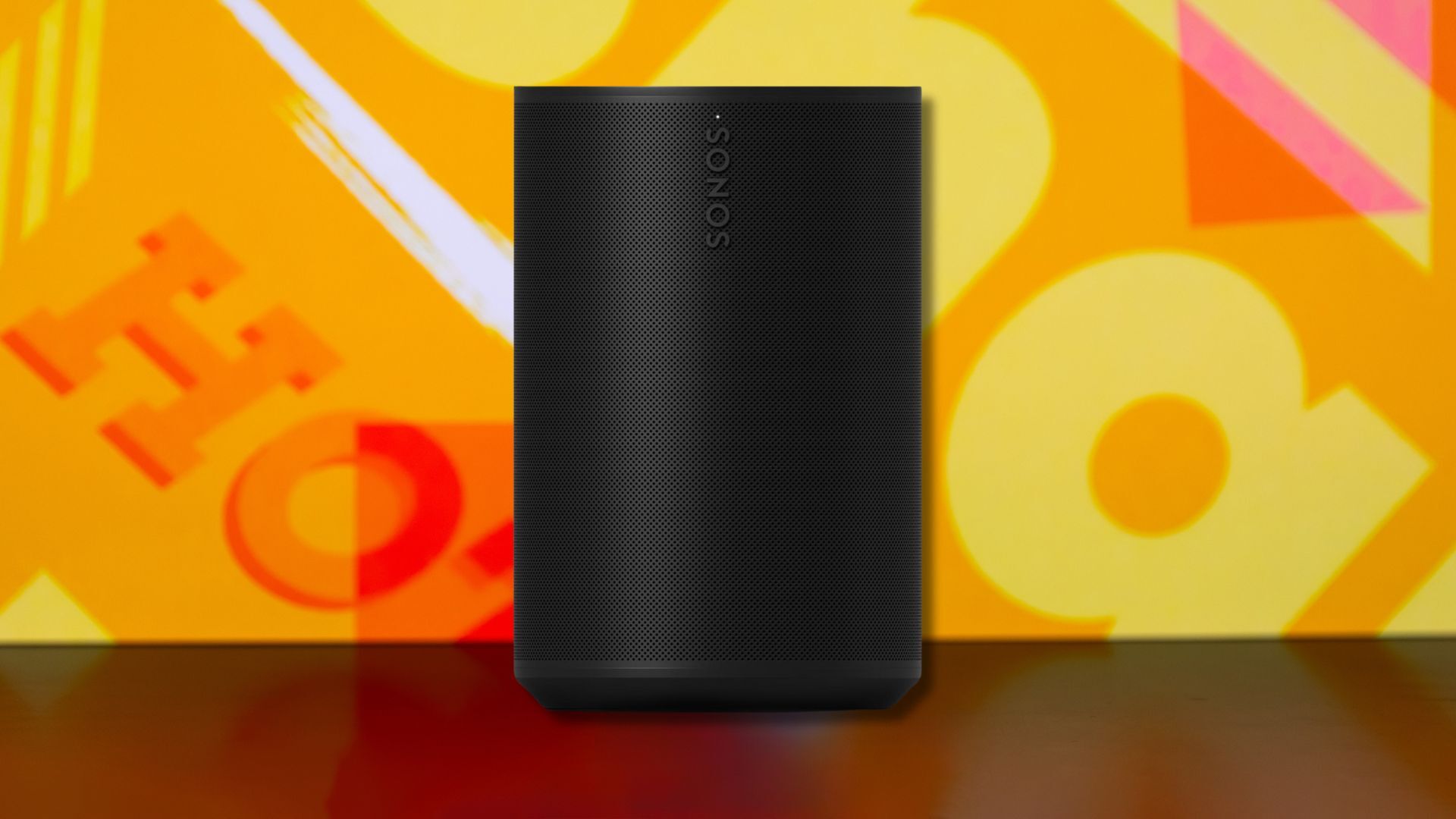 sonos era 100 speaker against a yellow patterned background