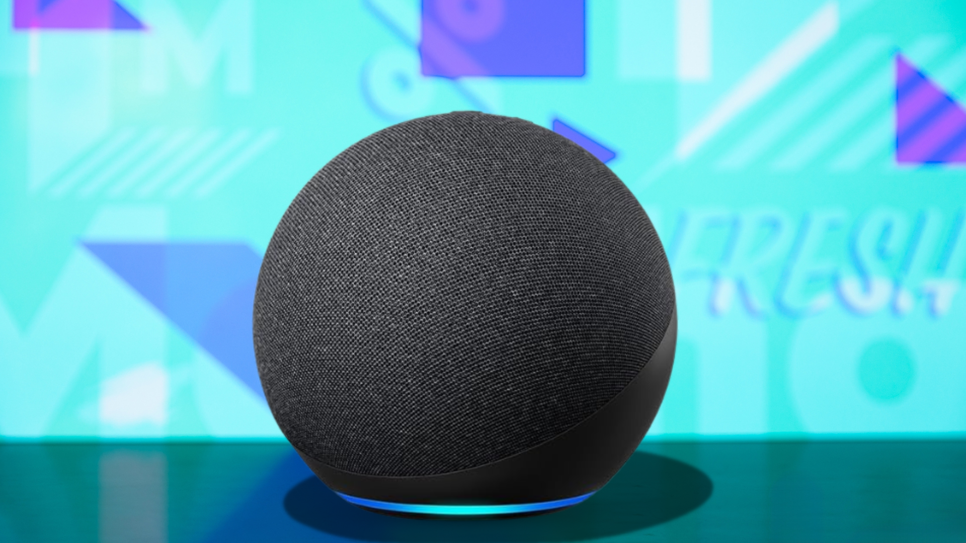 An Amazon Echo on a colorful background.