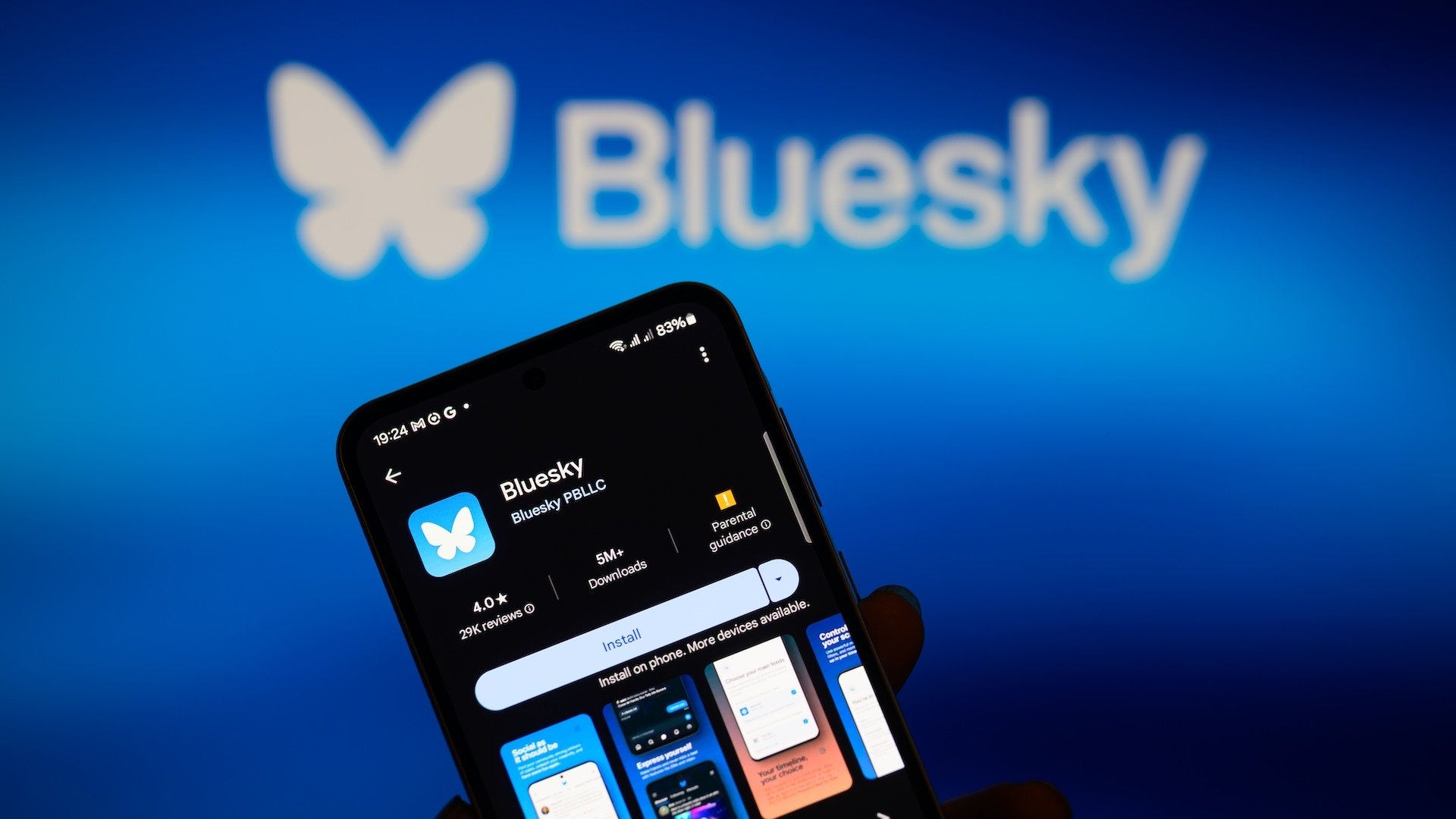 The Bluesky app logo appears on a smartphone with Bluesky visible in the background.