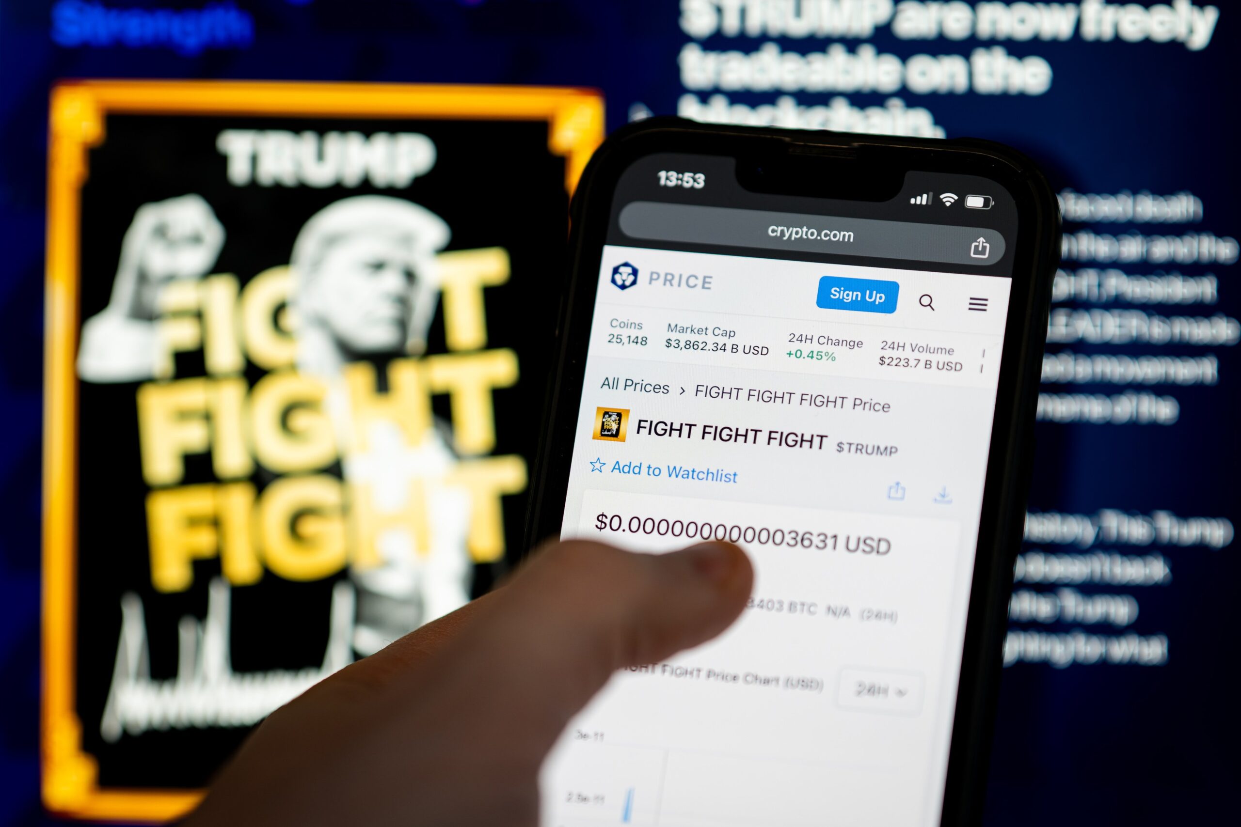 User buying $TRUMP on mobile device with memecoin website in the background