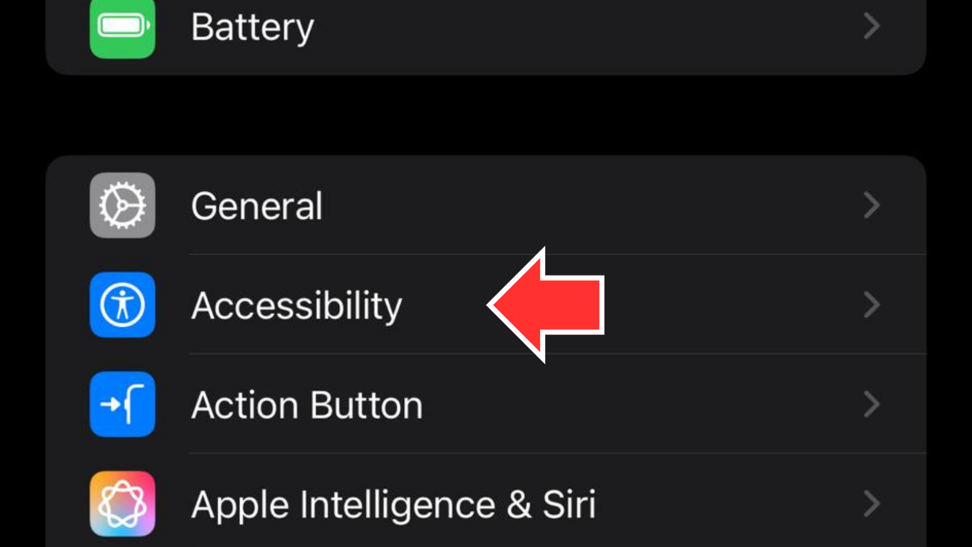 A screenshot of an iPhone's Settings menu with a red arrow pointing at the Accessibility option.