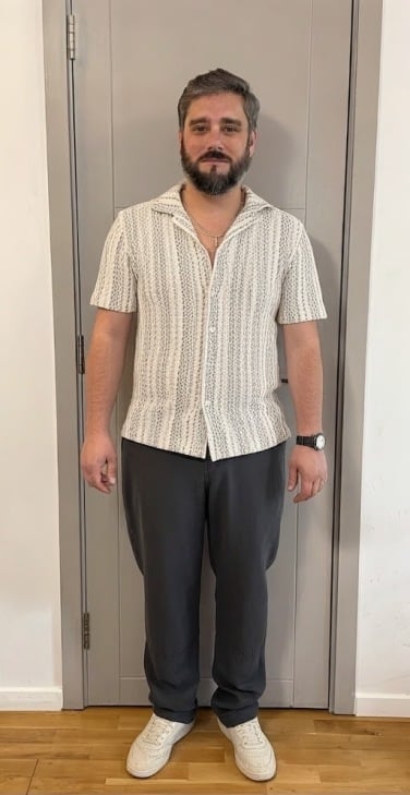 ai generated image of author wearing a button up shirt