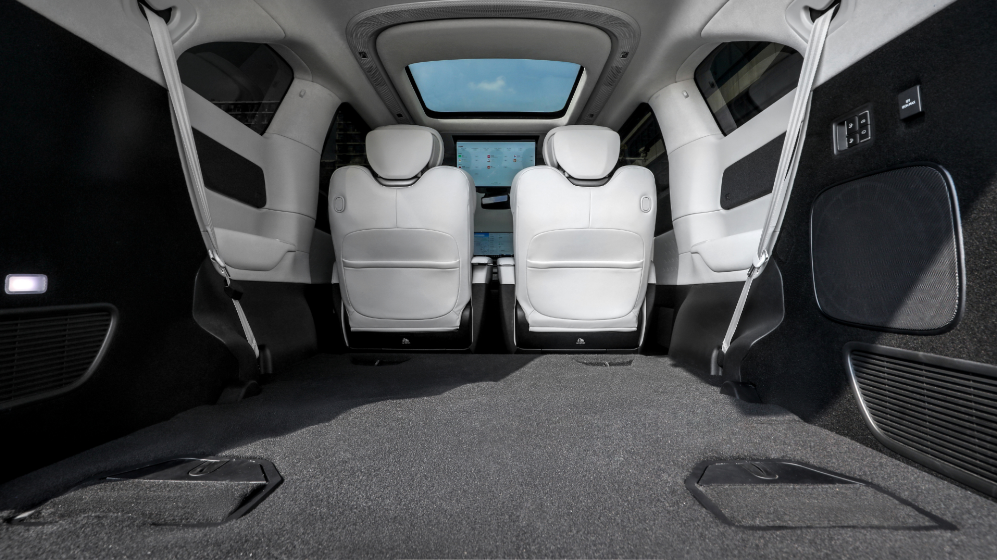 The X9's large storage space when the back row of seats is folded down.