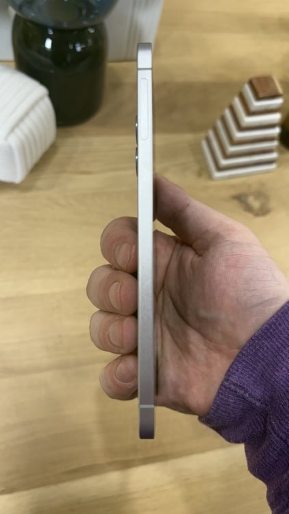 Me holding the Galaxy S25 Edge from the side so you can see how thin it is