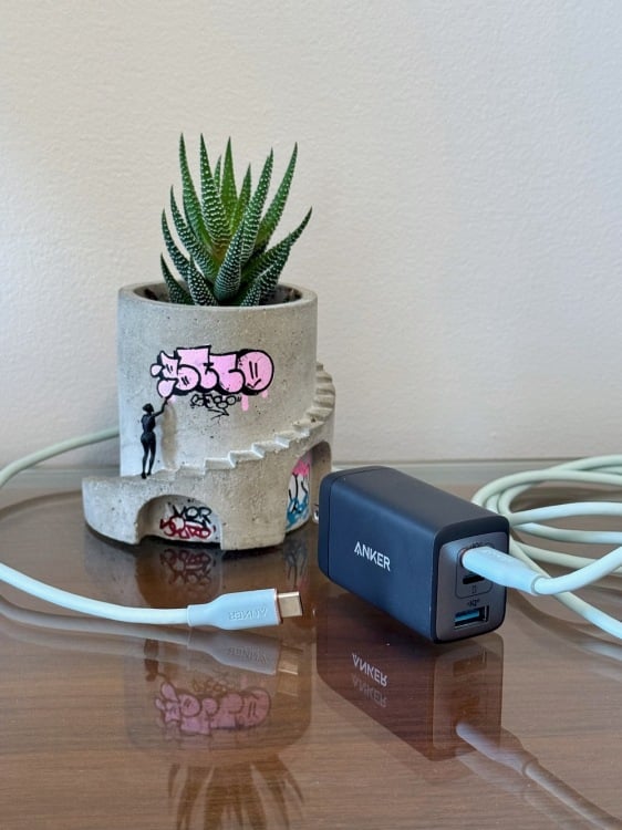 anker 735 charger nano ii on desk with usb-c charging cable