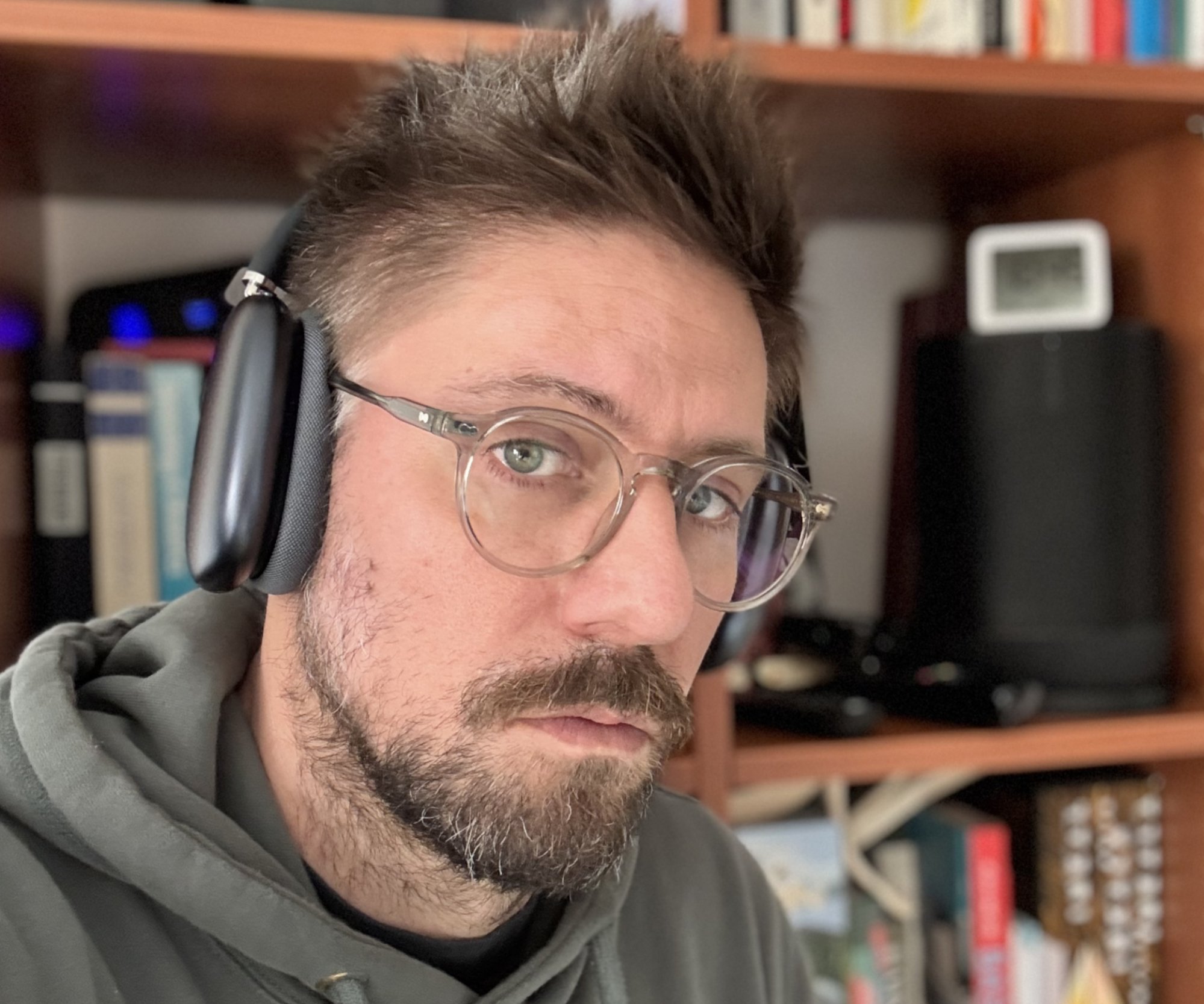 author wearing Apple AirPods Max headphones