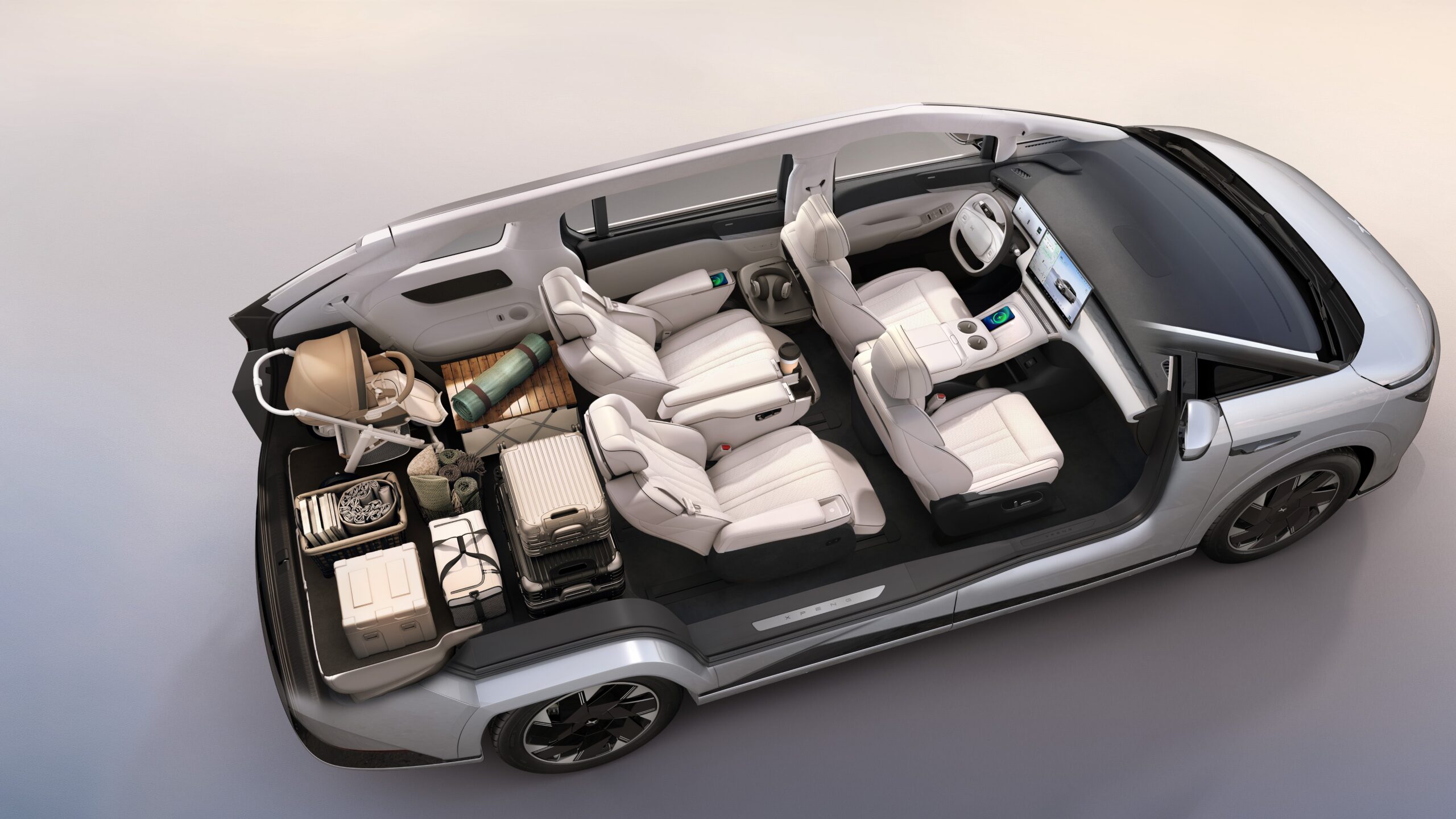 A cutaway illustration of XPENG's X9 with the third row of seats folded down, creating significant storage space.