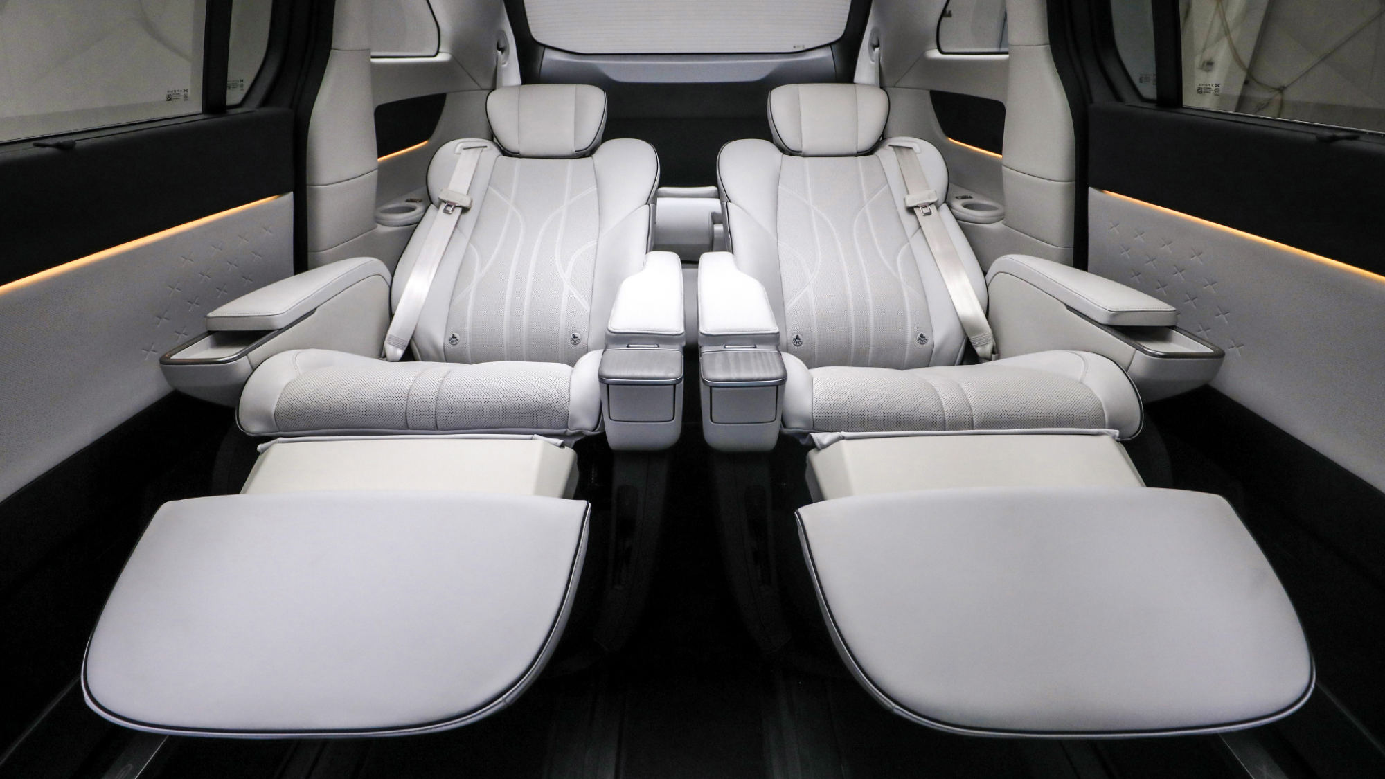 The XPENG X9's two middle seats reclined.