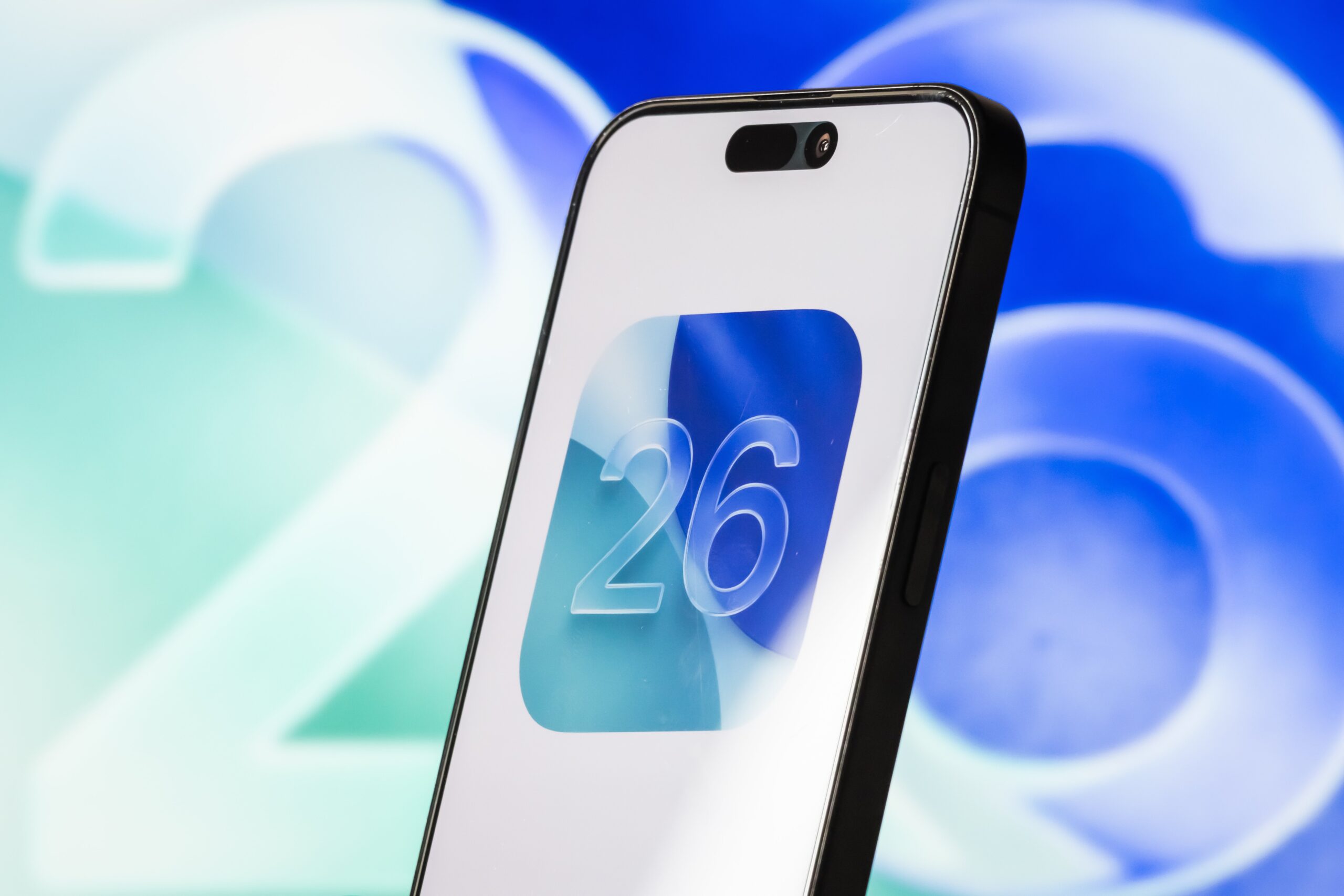 apple's ios 26 logo on an iphone