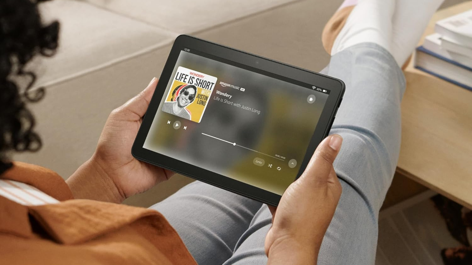 person holding Amazon Fire HD 8 Plus tablet