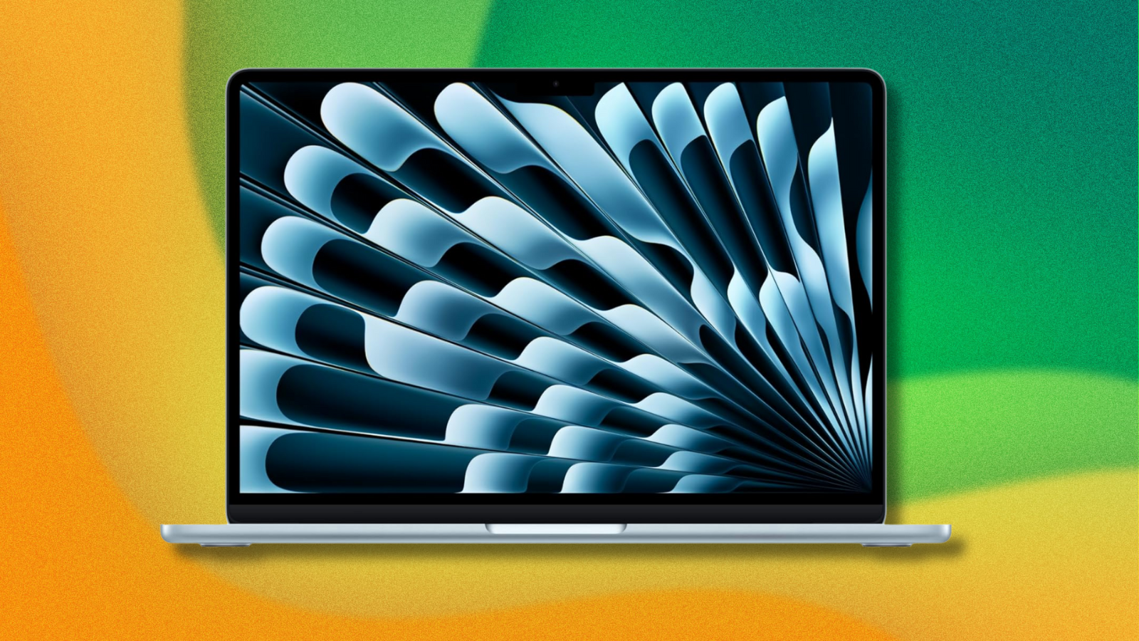 MacBook Air on green and yellow abstract background