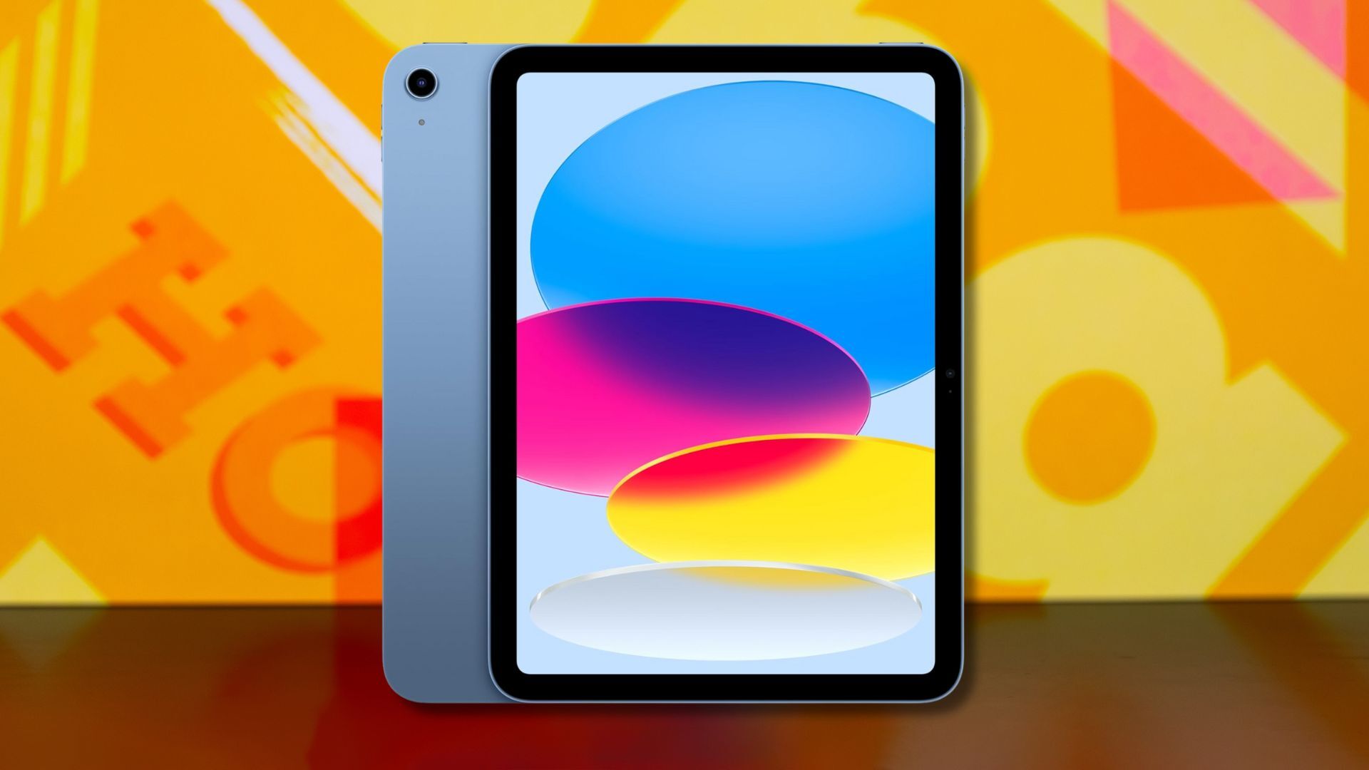 apple ipad against a yellow patterned background