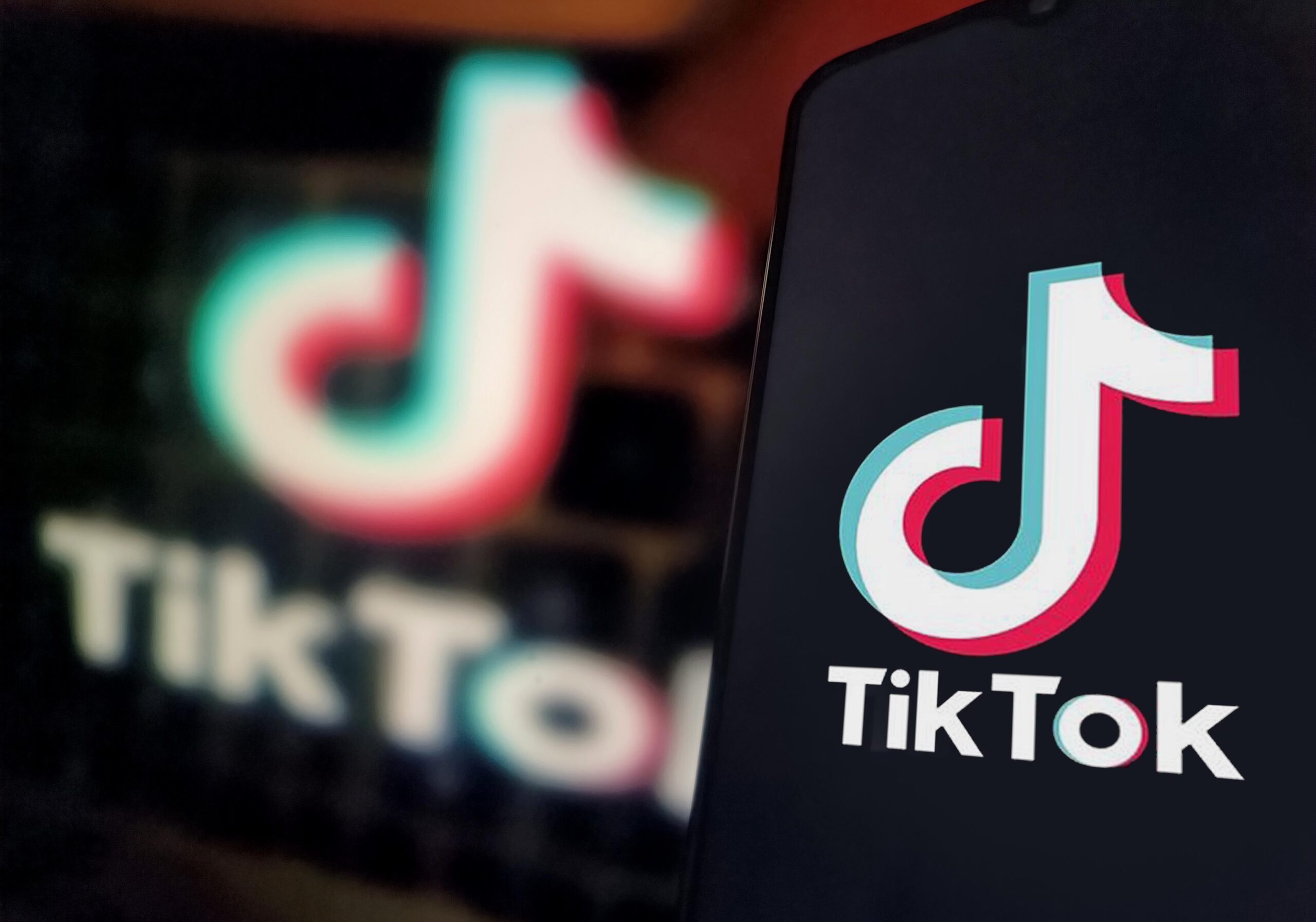 An illustration photo shows TikTok logo displayed in a smartphone in Suqian City, Jiangsu Province, China on June 10, 2025.