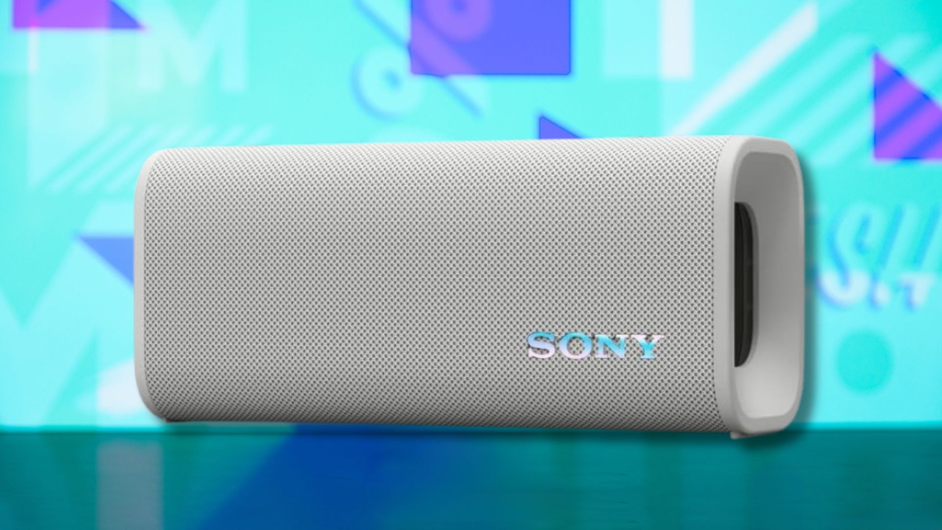 sony ult field 3 portable speaker against a light blue patterned background