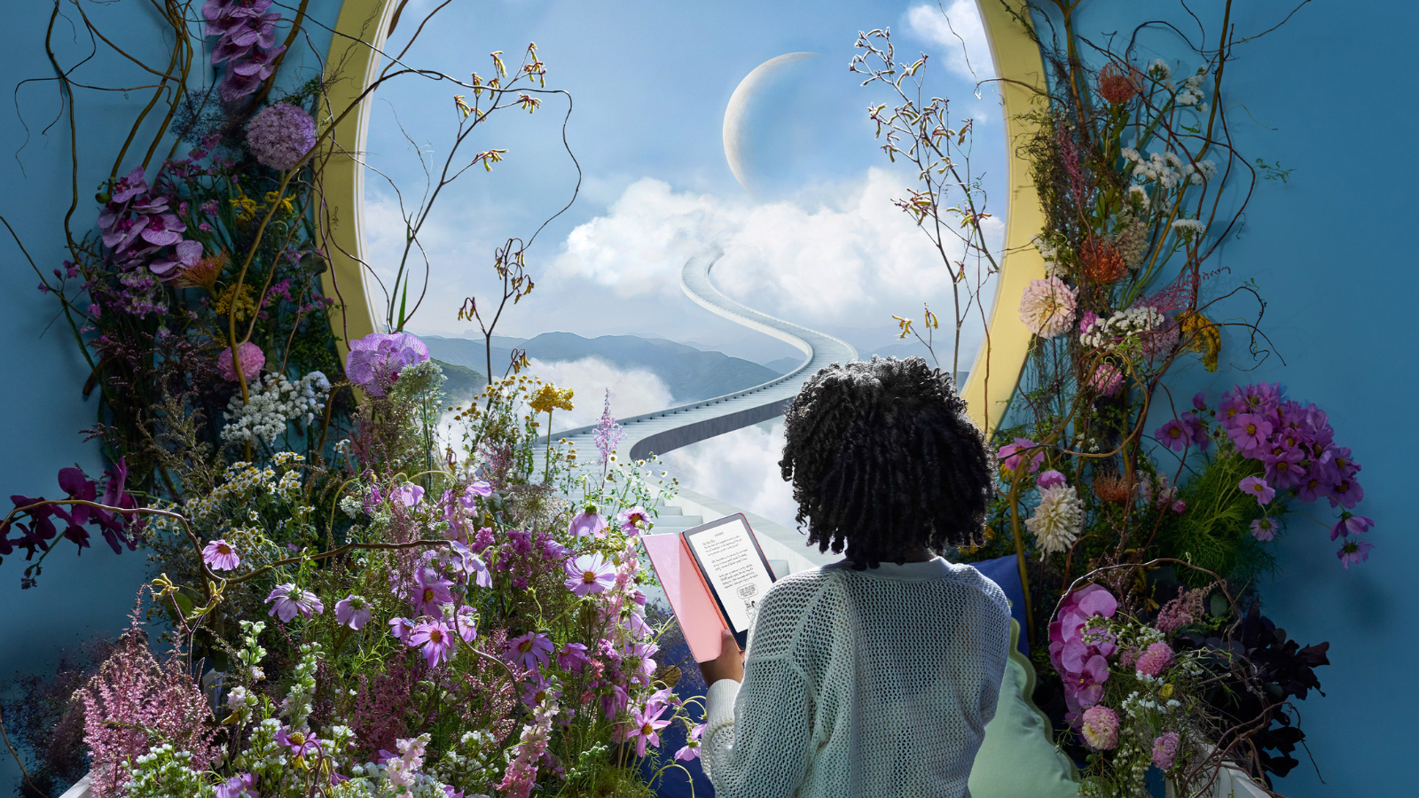 young girl reading Kindle Paperwhite Kids with a portal of flowers and imagination