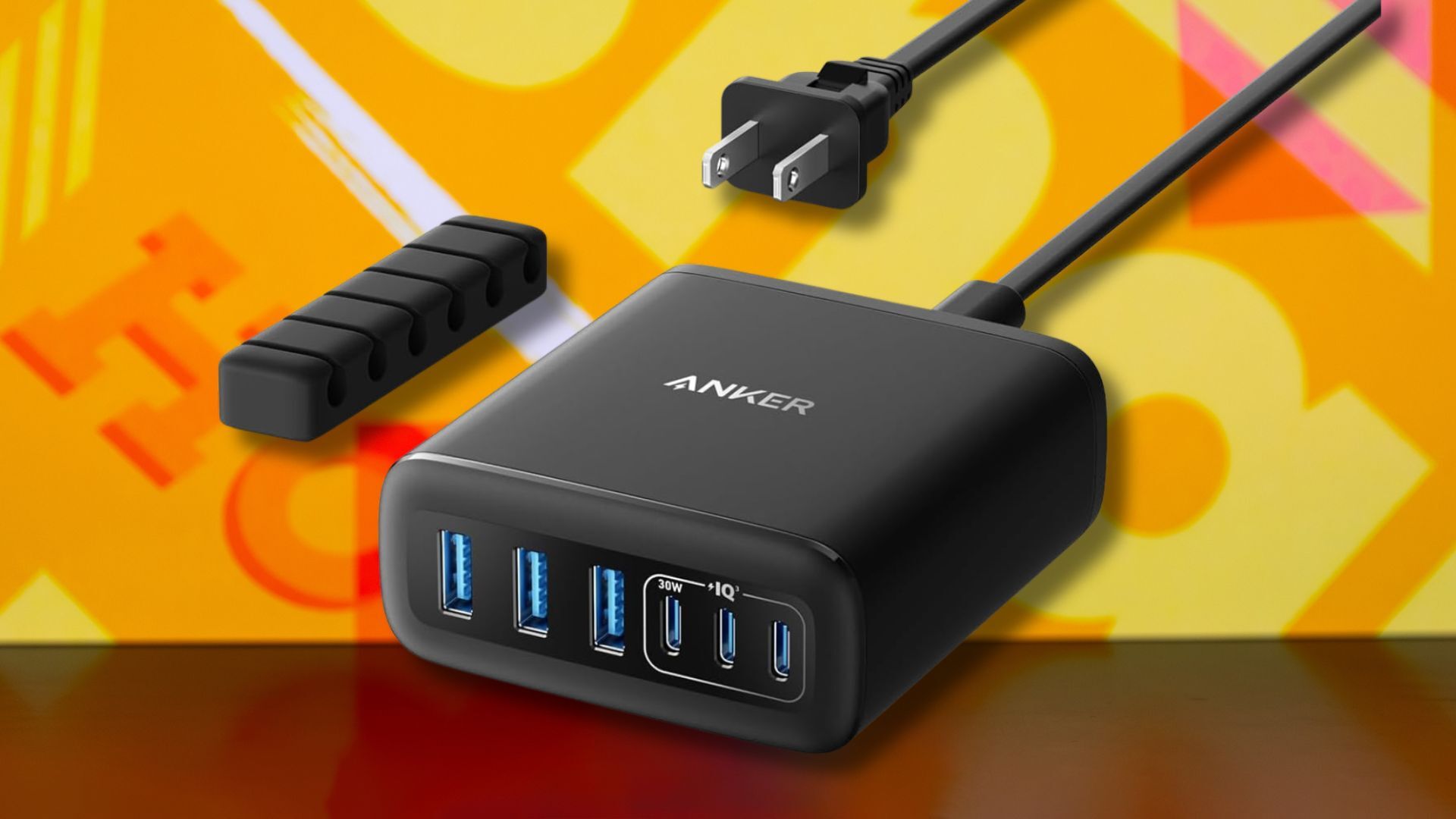 Anker desktop charger against a yellow patterned background