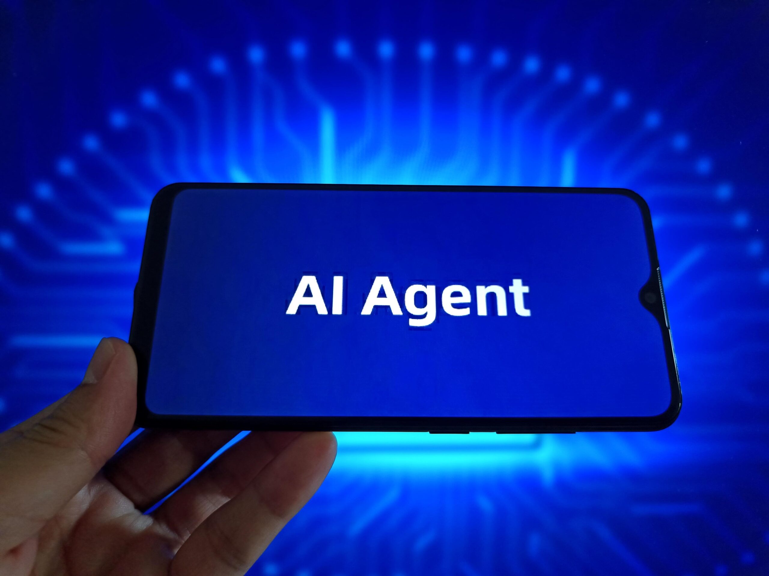  In this photo illustration, the logo of AI Agent is displayed on a smartphone screen