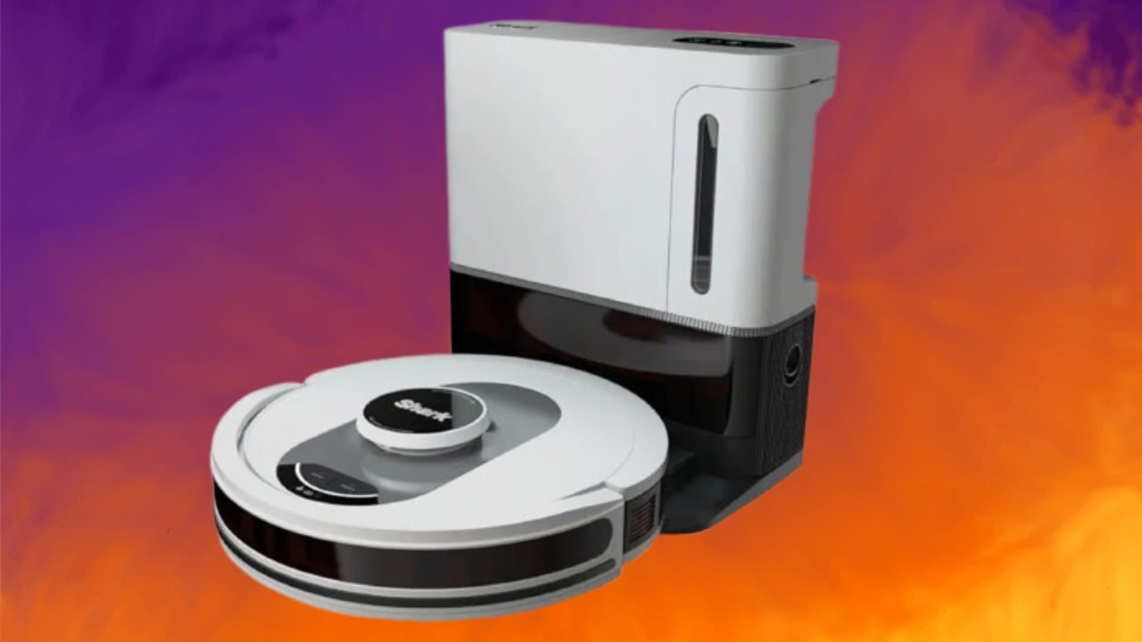The Shark AI Ultra voice control robot vacuum on a purple and orange background