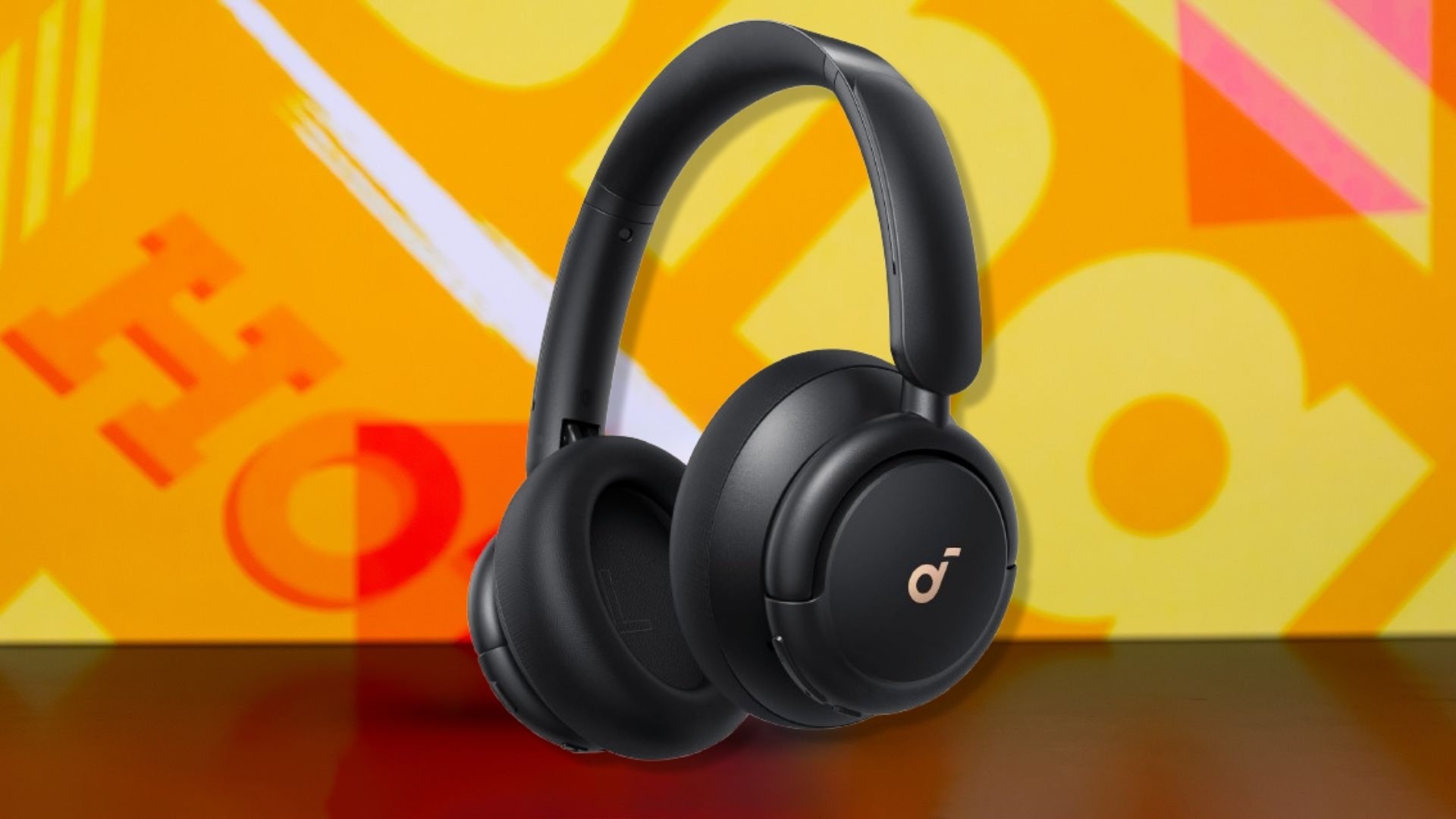 Soundcore Life Q30 by Anker noise-cancelling headphones on an orange background
