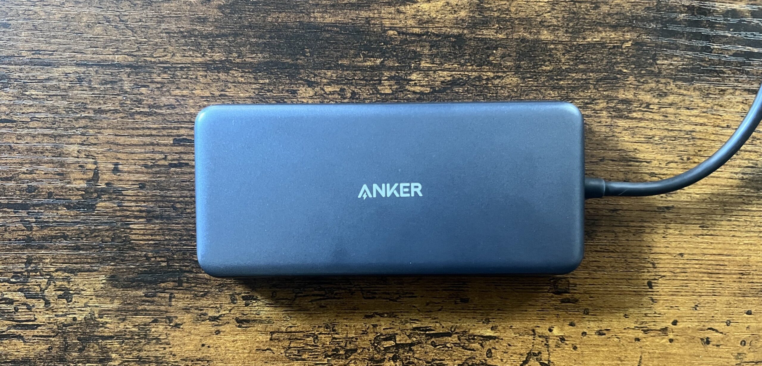 Photo of Anker PowerExpand 8n1 against a wood background
