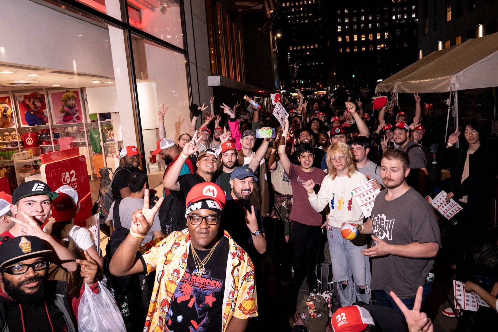 Customers wait in line outside a Nintendo Co. store in New York City.