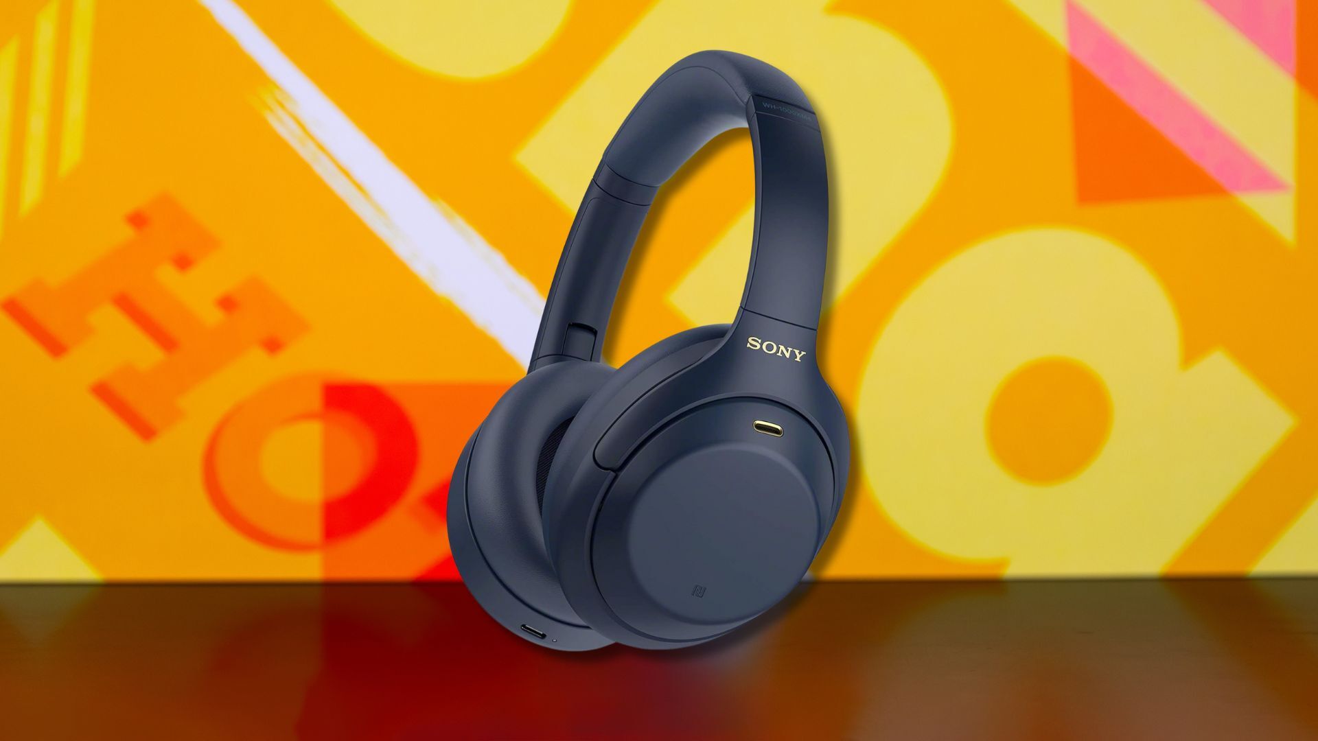 sony wh-1000xm4 headphones against a yellow patterned background