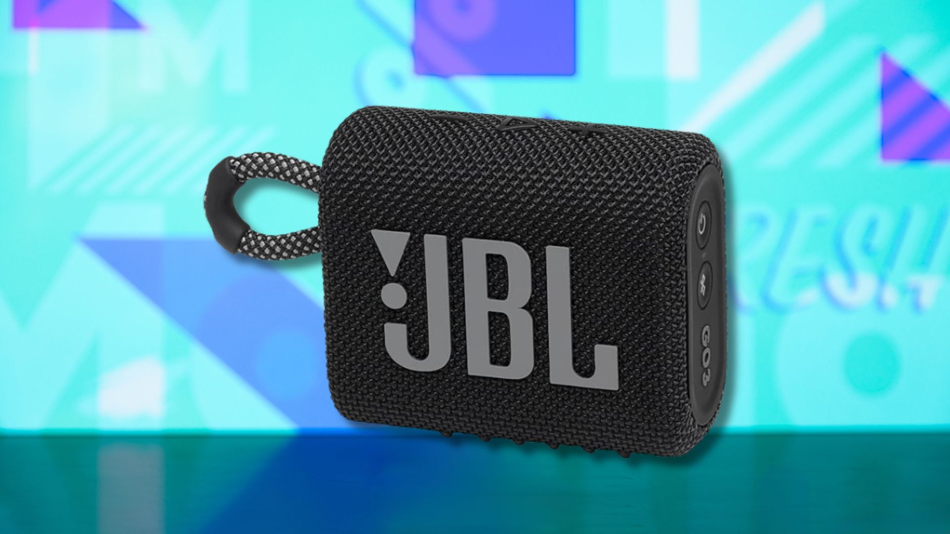 jbl go 3 portable speaker against a light blue patterned background