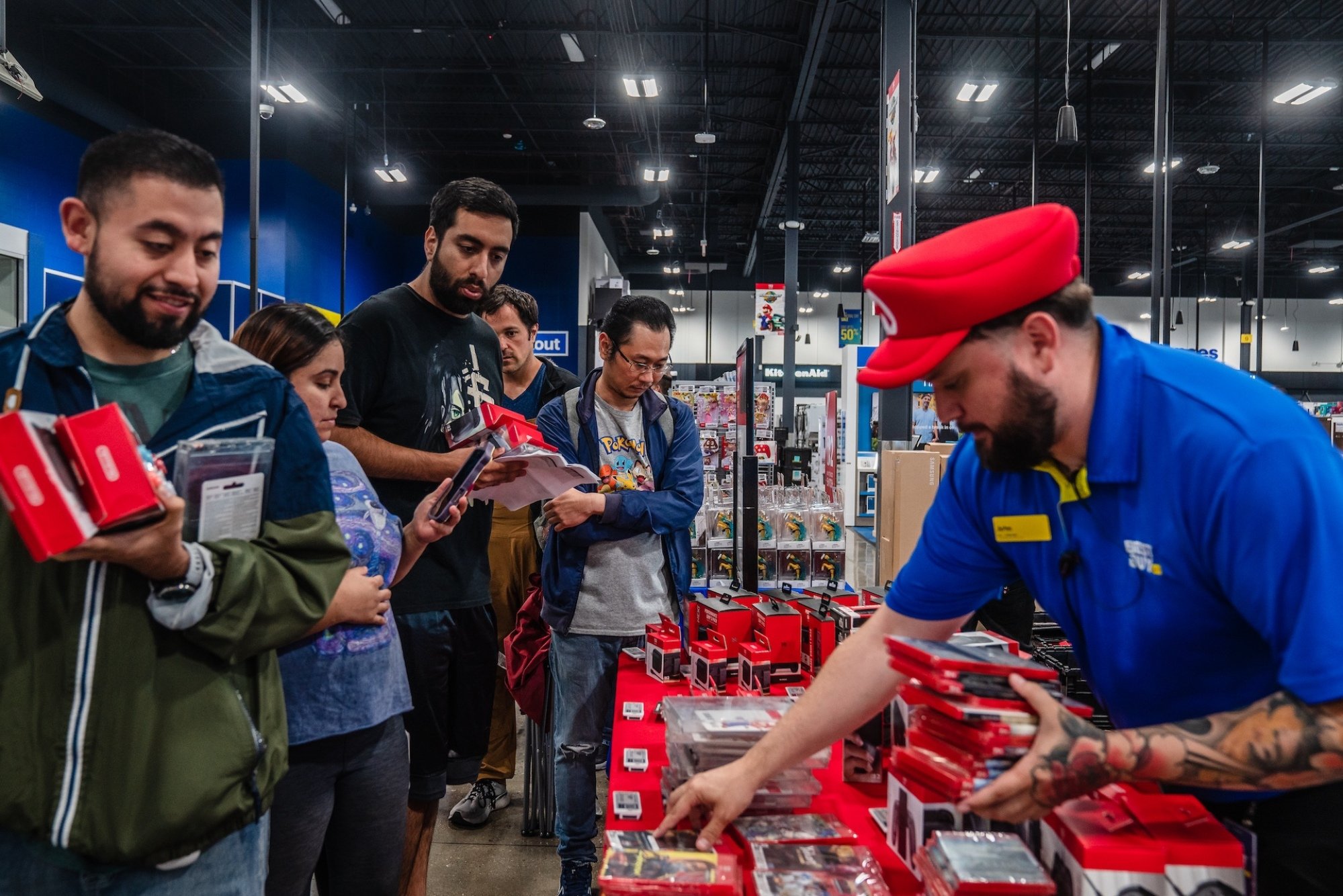 Customers wait in line in a Best Buy in San Diego, California.