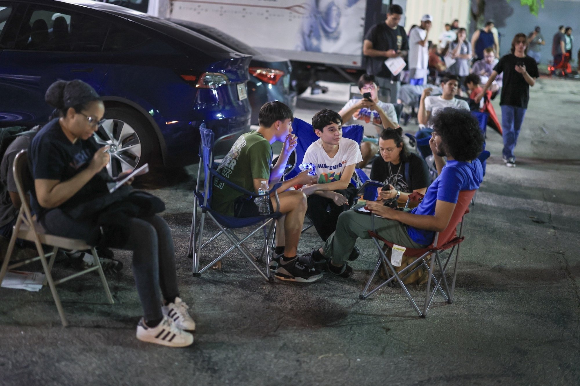 Customers wait in line outside a Best Buy in Pembroke Pines, Florida.